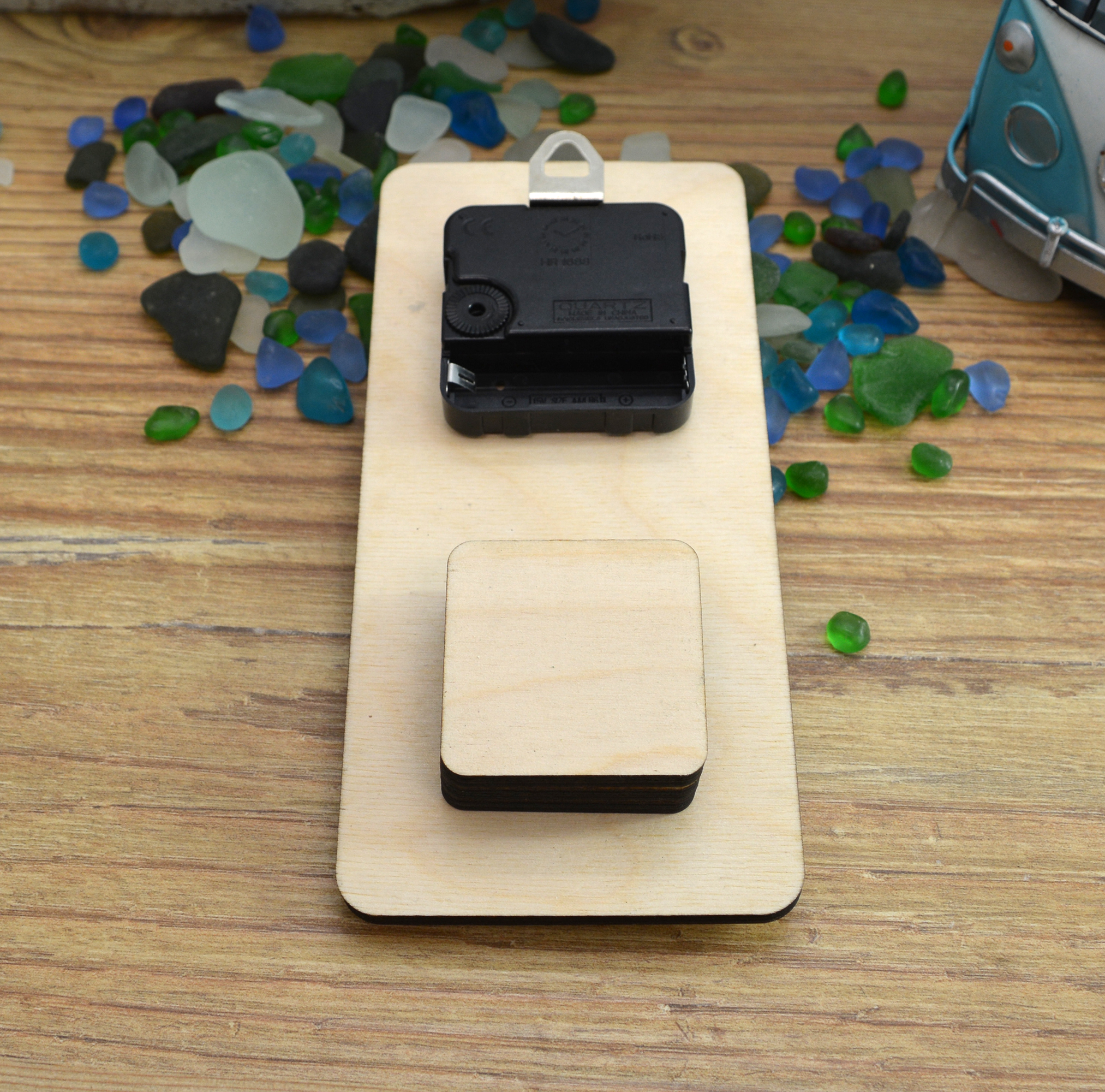 Handmade Wooden Hanging Tidal Clock With Unique Ceramic Wave Design - Image 3